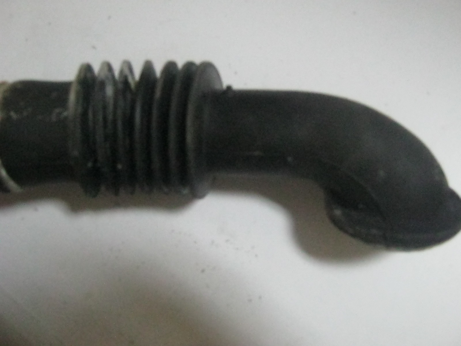 патрубок Indesit 671 xw